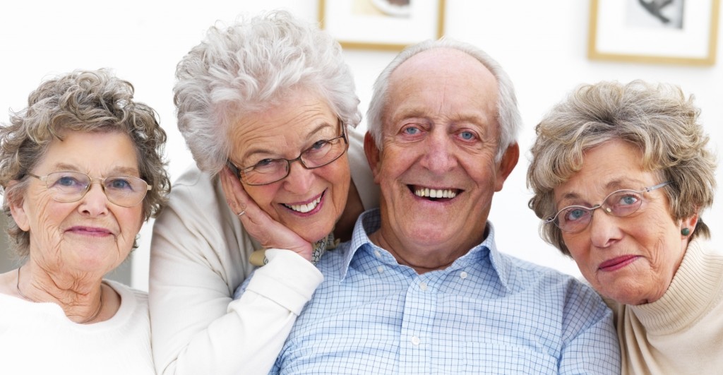 Closeup portrait of a group of old people smiling